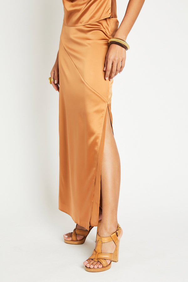 Close-up of leg slit of Naomi silk skirt Copper
